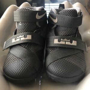 L. James Nike baby sneakers size 5 gray and white.